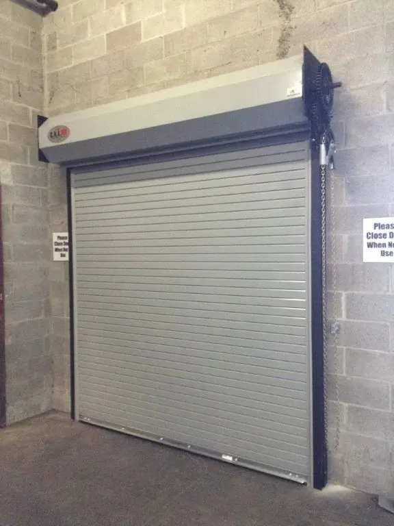 A commercial rolling steel door installed inside a building