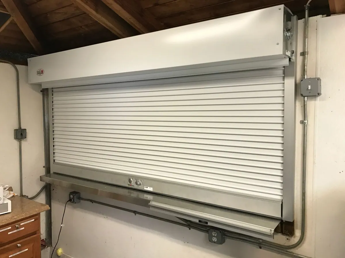 Garage door rollers and track serviced by Apex Door